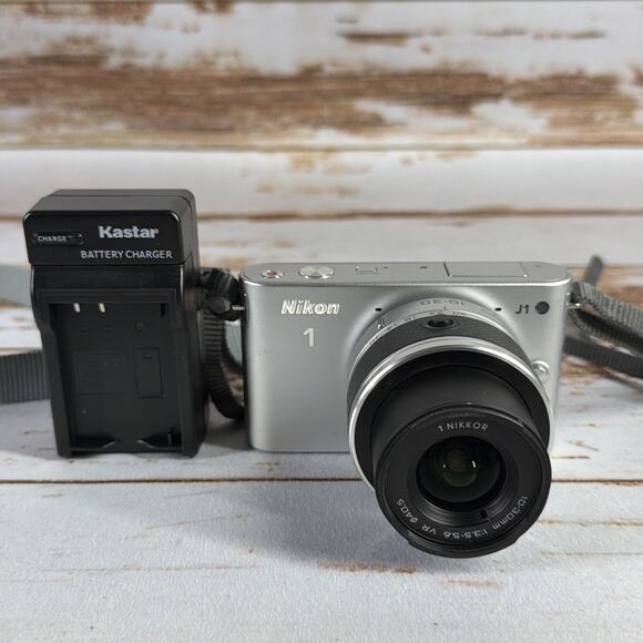 Nikon 1 J1 Mirrorless Camera Silver – Parts/Repair w/ Battery & Charger - Picture 1 of 5